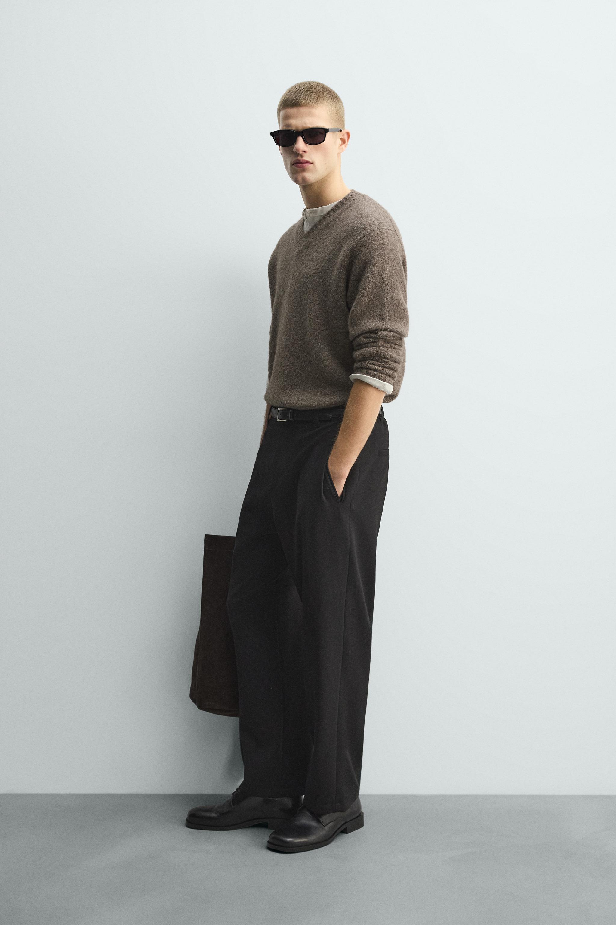 RELAXED FIT PLEATED PANTS
